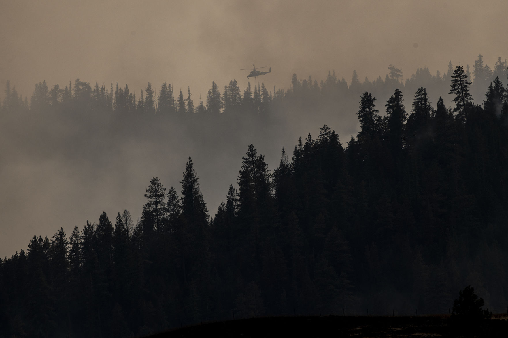 Helicopter above the ridgeline